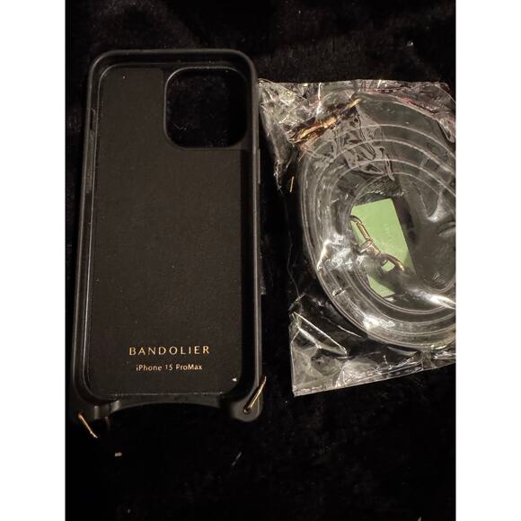 Bandolier studded MagSafe 15 pro max case &
Thick black & gold curb chain strap - Picture 7 of 8